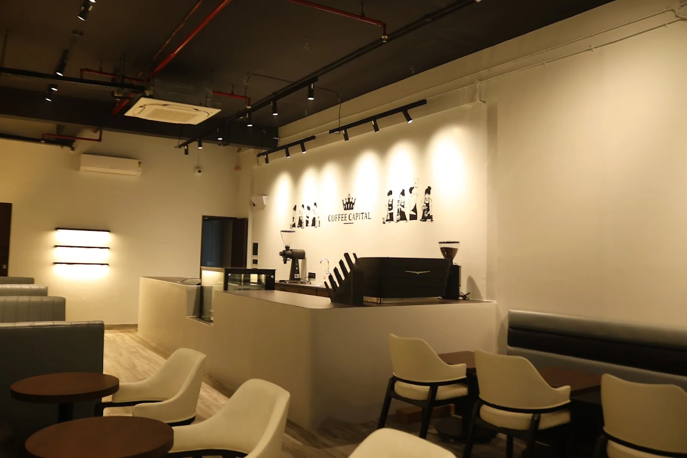 Coffee Capital crown mural and seating