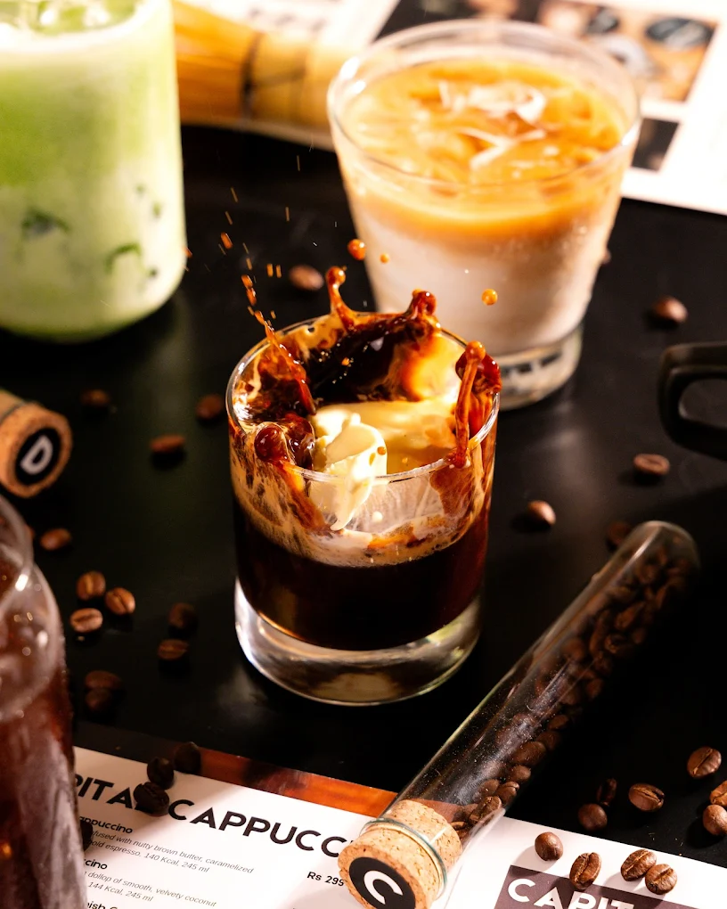 Splash shot of layered cold brew drinks on the menu card